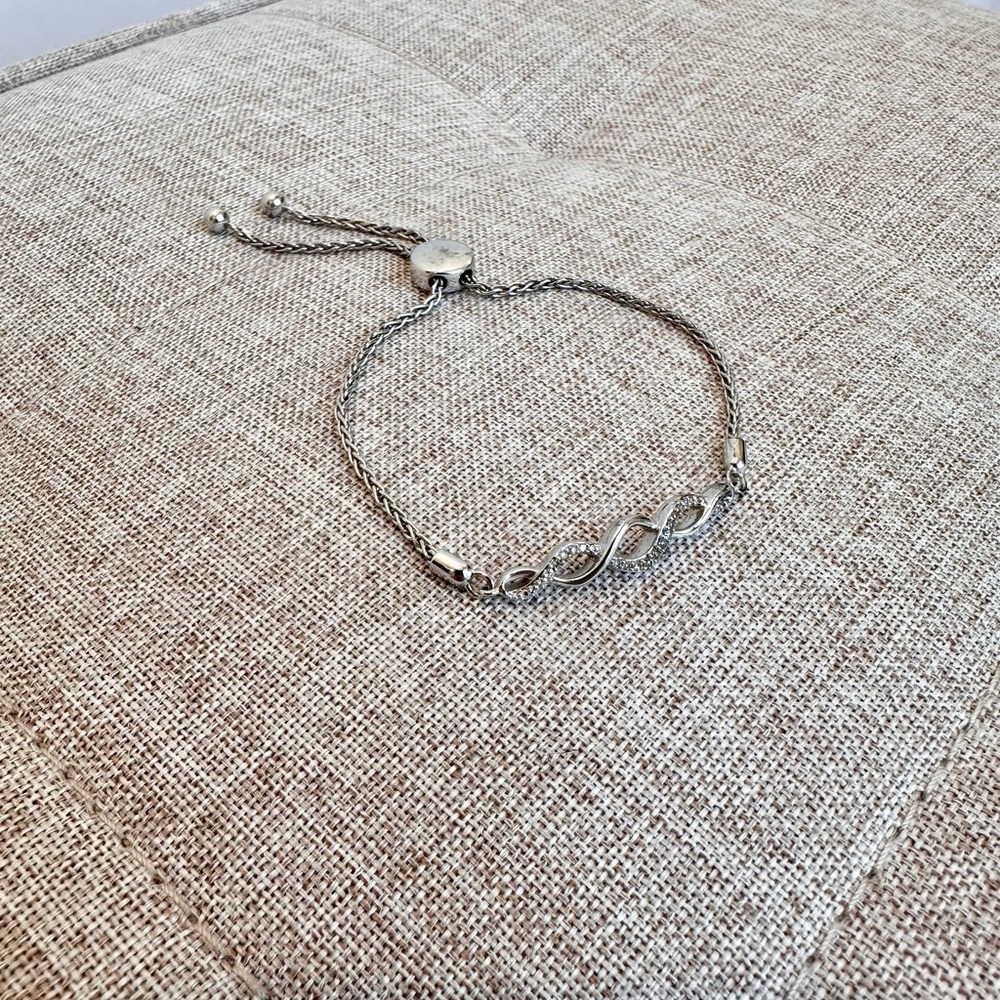 Elegant Twist Diamond Silver Bracelet with Bolo Clasp